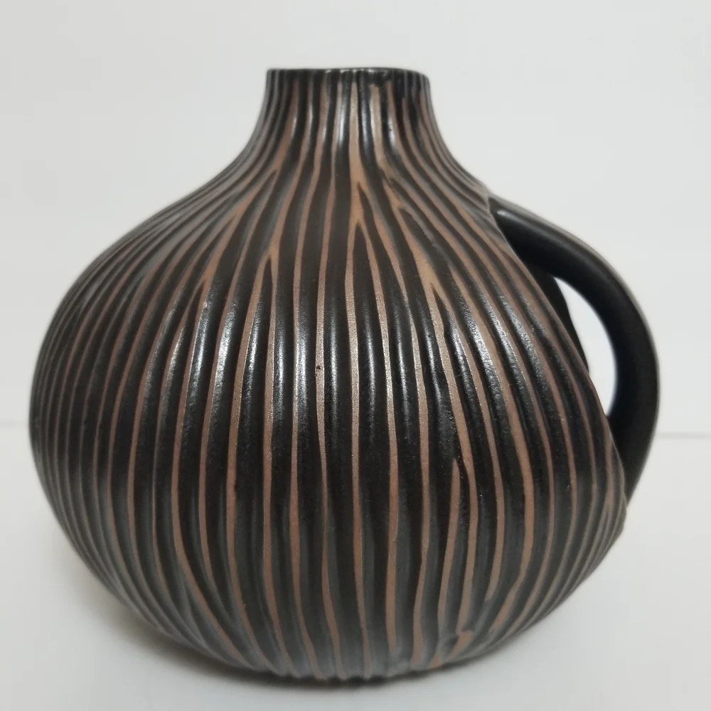 Vintage textured brown jar